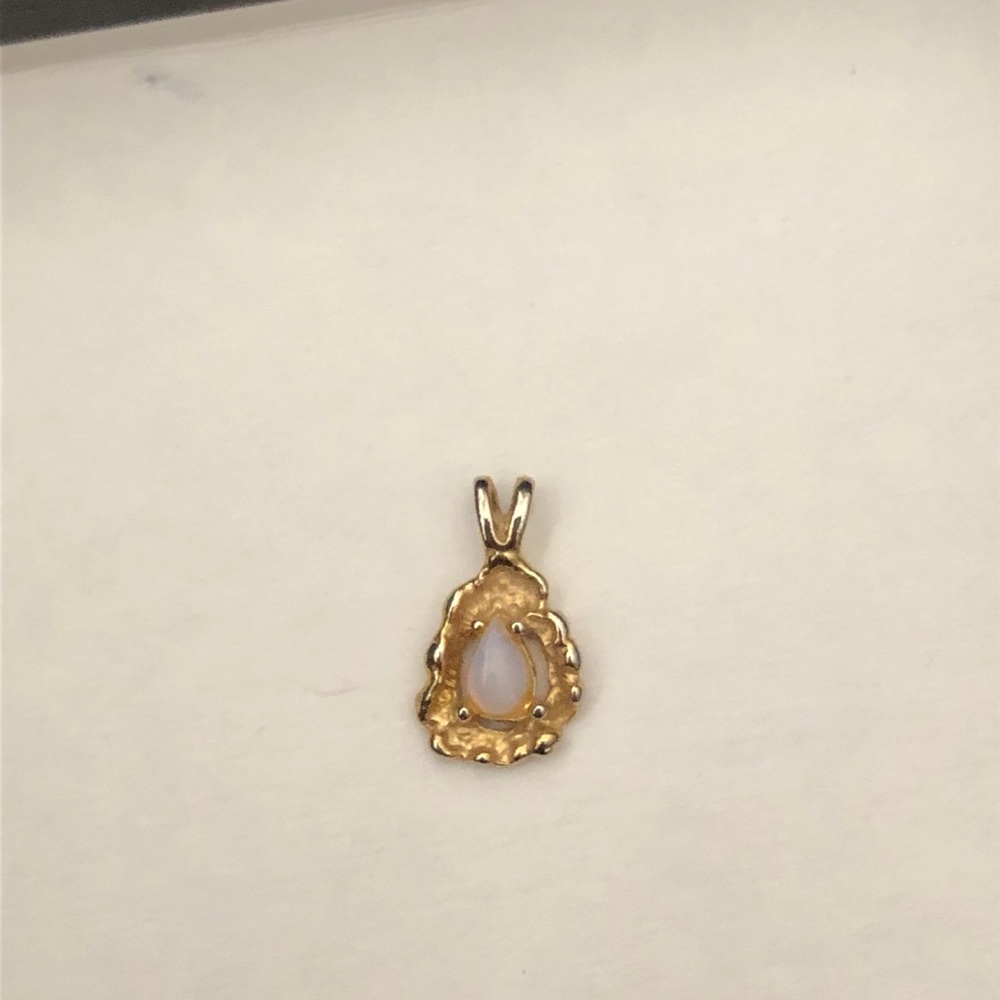 Gold opal pendant